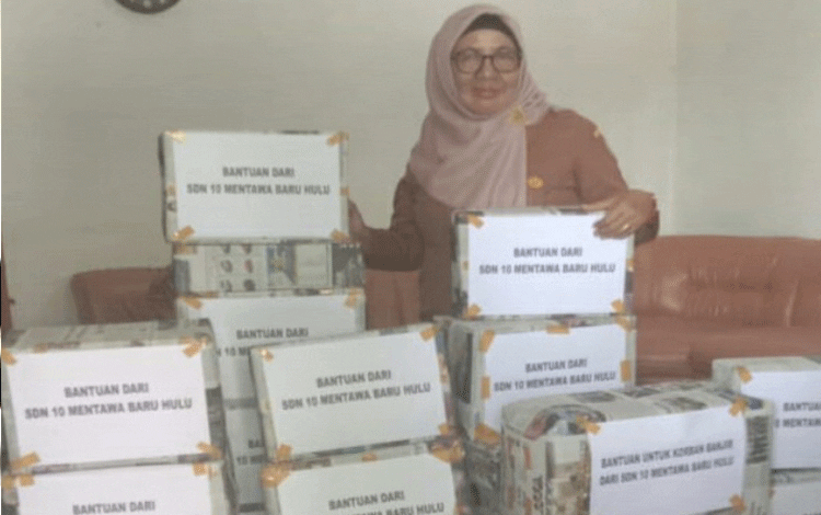 SDN 10 MB Hulu Salurkan Bantuan Korban Banjir