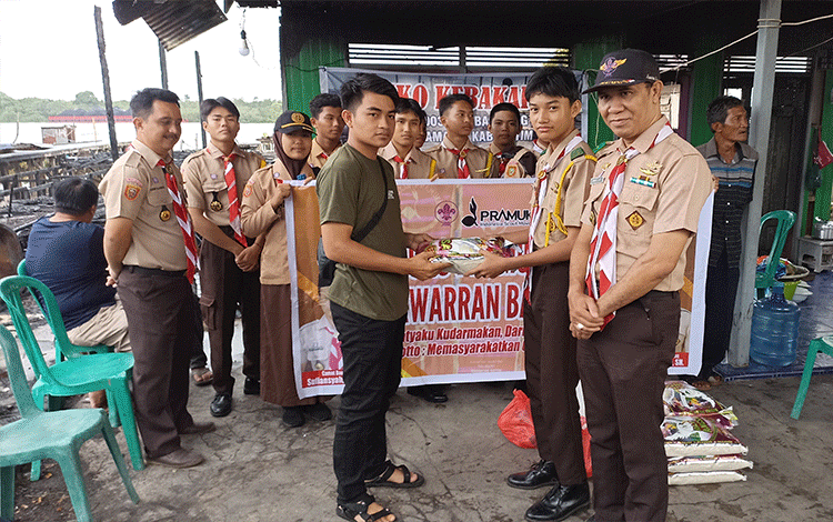 Dadang Apresiasi Inisiatif Kwarran Pramuka Baamang Bantu Korban Kebakaran Baamang Hulu
