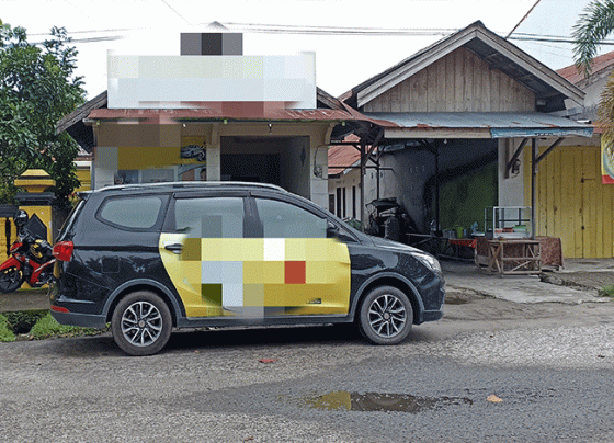 Iklan di kendaraan taksi online yang disinggung untuk dikenakan pajak di Kotim.