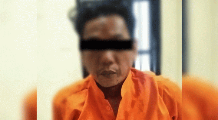 Pelaku AH saat diamankan Polsek Pahandut.