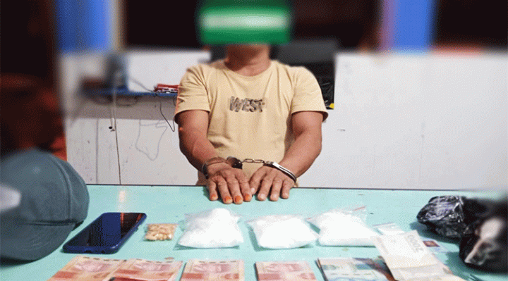 Terduga pelaku AB beserta barang bukti diamankan di Mapolresta Palangka Raya.