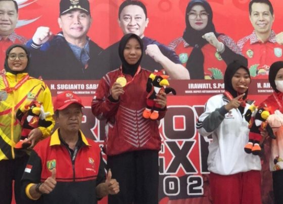 Pelatih ekskul pencak silat SDN 4 Ketapang, Imelda Prameswari berhasil meraih medali emas Porprov Kalteng 2023, Jumat 4 Agustus 2023.