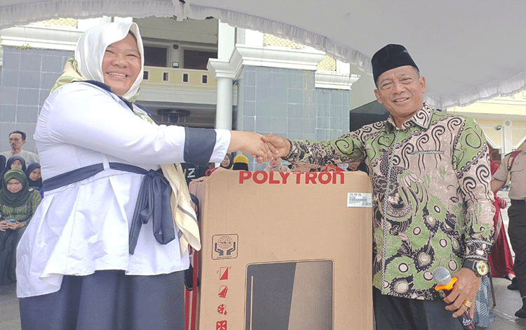 Turut Meriahkan Tahun Baru Islam, Heriyus Sumbang Doorprize