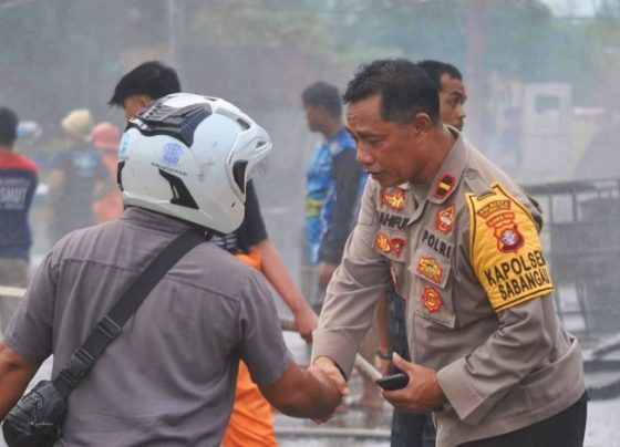 Kapolsek Sebangau, Ipda Ali Mahfud di lokasi kebakaran.