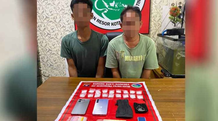 ZA (39) dan SR (20) tersangka narkotika dan barang bukti saat ditahan Polres Kotim