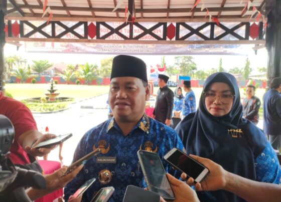 Bupati Kotim Halikinnor dan Wakil Bupati Kotim Irawati saat diwawancarai.