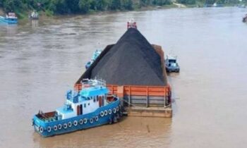 Ilustrasi tugboat dan tongkang pembawa batu bara milik perusahaan.