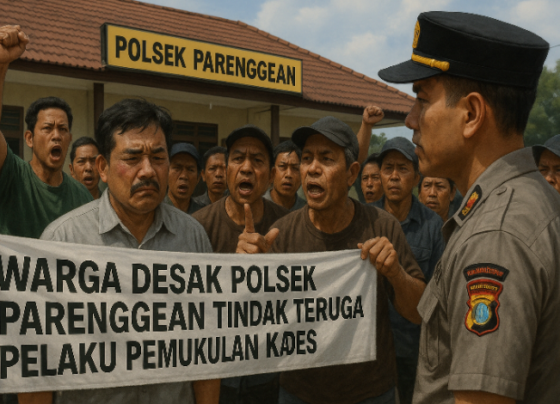Ilustrasi warga mendesak Polsek Parenggean menangkao pemukul Kades Kabuau.