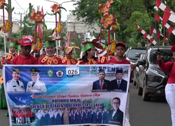 SMPN 1 Sampit Gelar Pawai HUT Ke-80 Republik Indonesia.